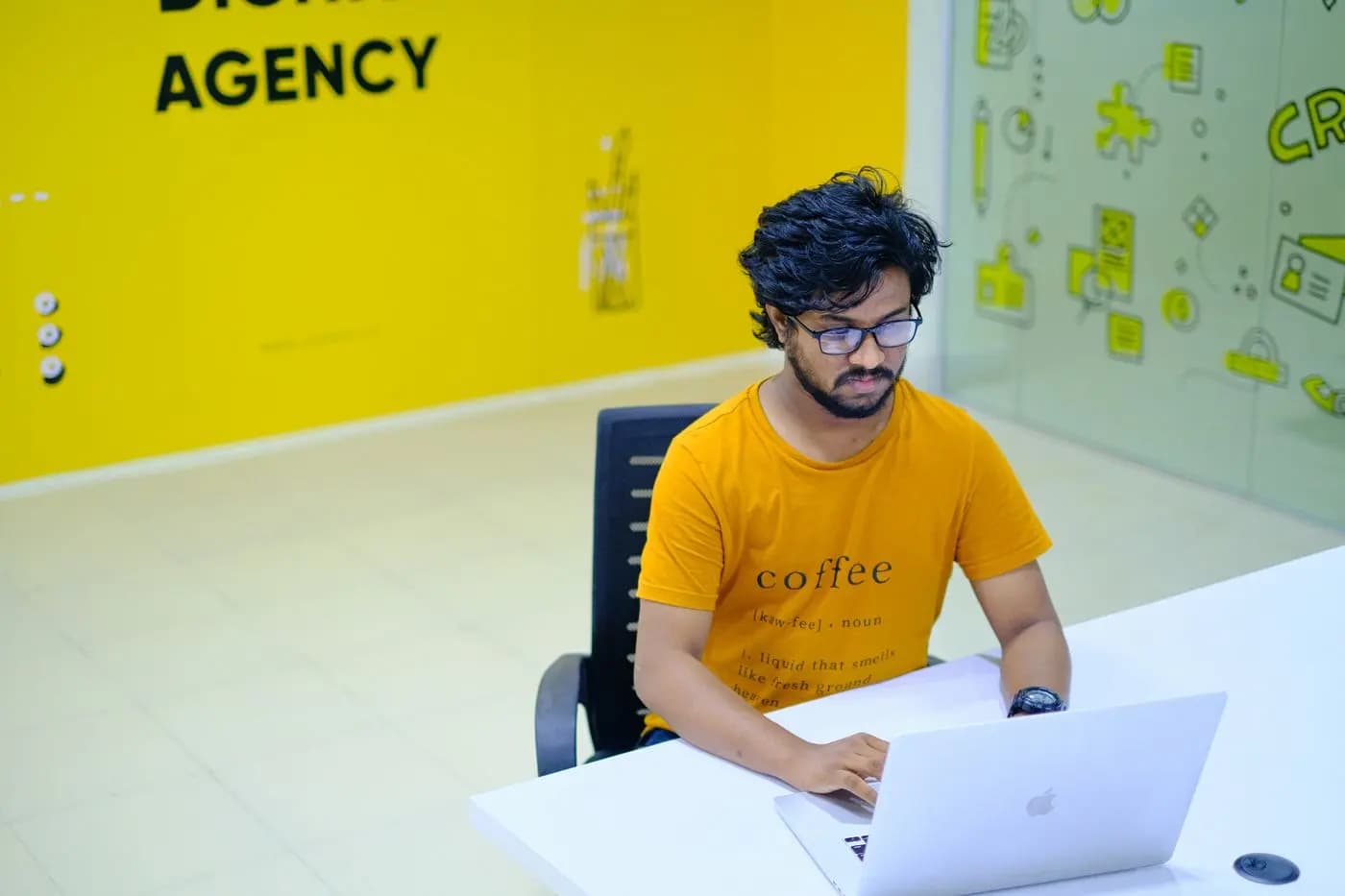 A Bangladeshi team working together at a Dhaka office